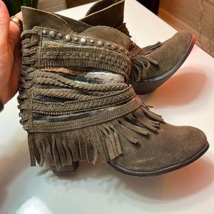 Leather boots with fringe, braids and yarn design